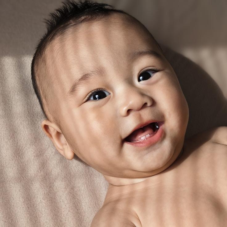 Avery Chen, Lead Design Curator at BeaconFieldPage, reviewing corporate floral arrangements